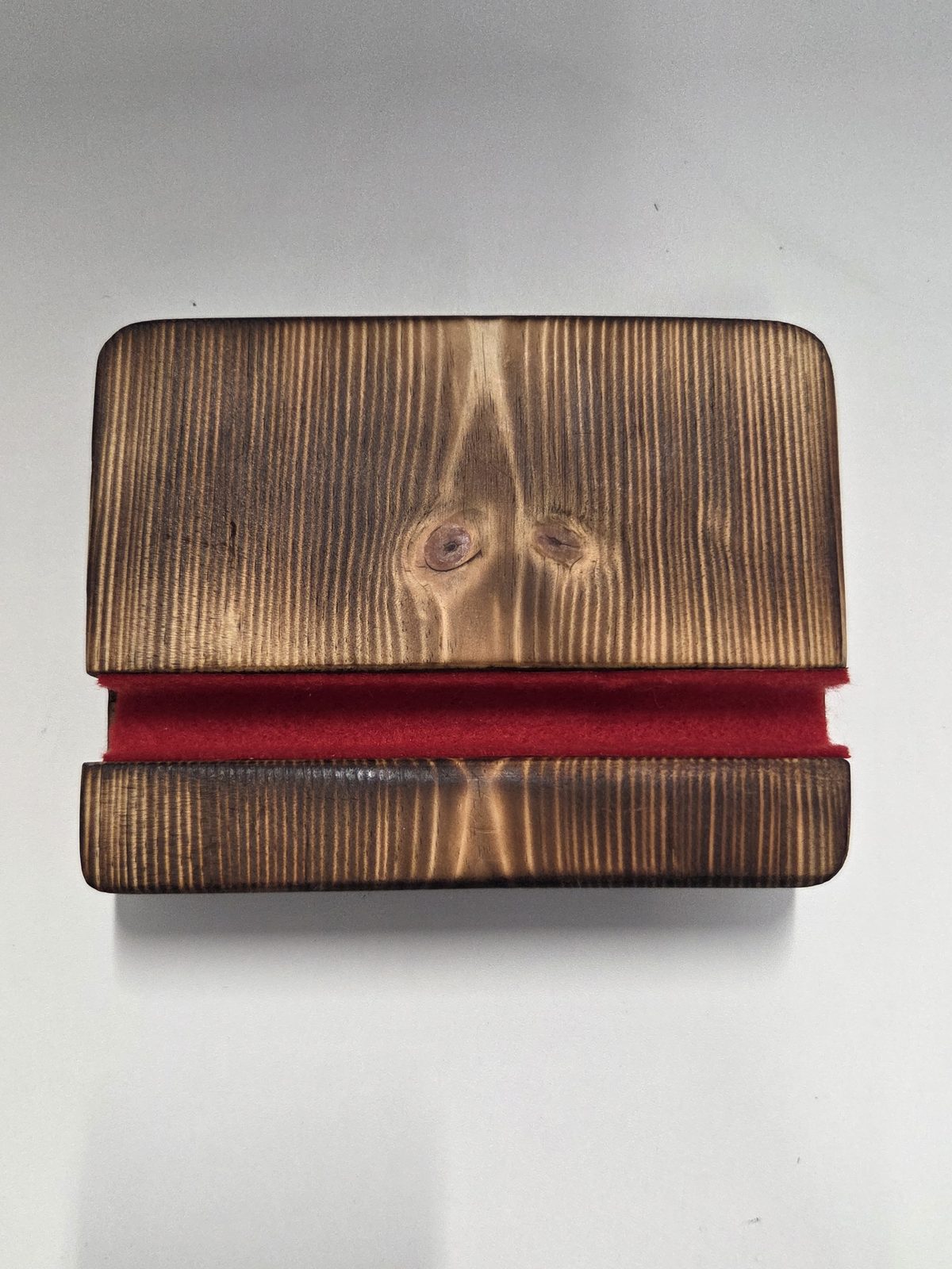 Charred pine phone stand