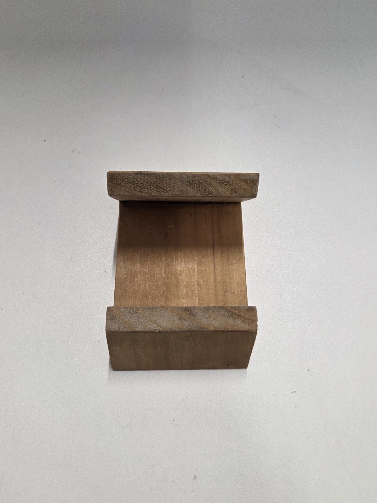Light pine phone cradle